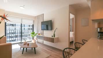 Apartamento sênior | Área de estar | TV de tela plana