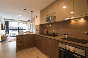 Apartamento (802) | Cocina privada | Frigorífico, microondas, horno y licuadora