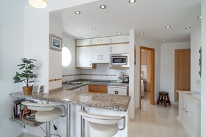 Fridge, microwave, coffee/tea maker, toaster
