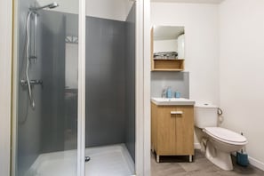 Shower, hair dryer, towels, soap