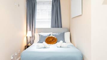 1 bedroom, desk, iron/ironing board, travel cot
