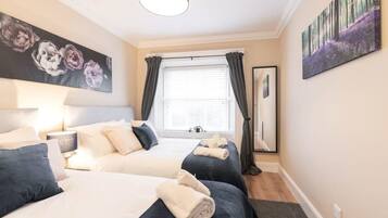 1 bedroom, desk, iron/ironing board, travel cot