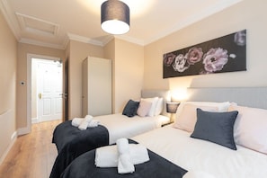 1 bedroom, desk, iron/ironing board, travel cot