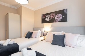 1 bedroom, desk, iron/ironing board, travel cot