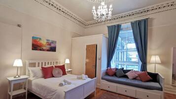 1 bedroom, desk, iron/ironing board, travel cot