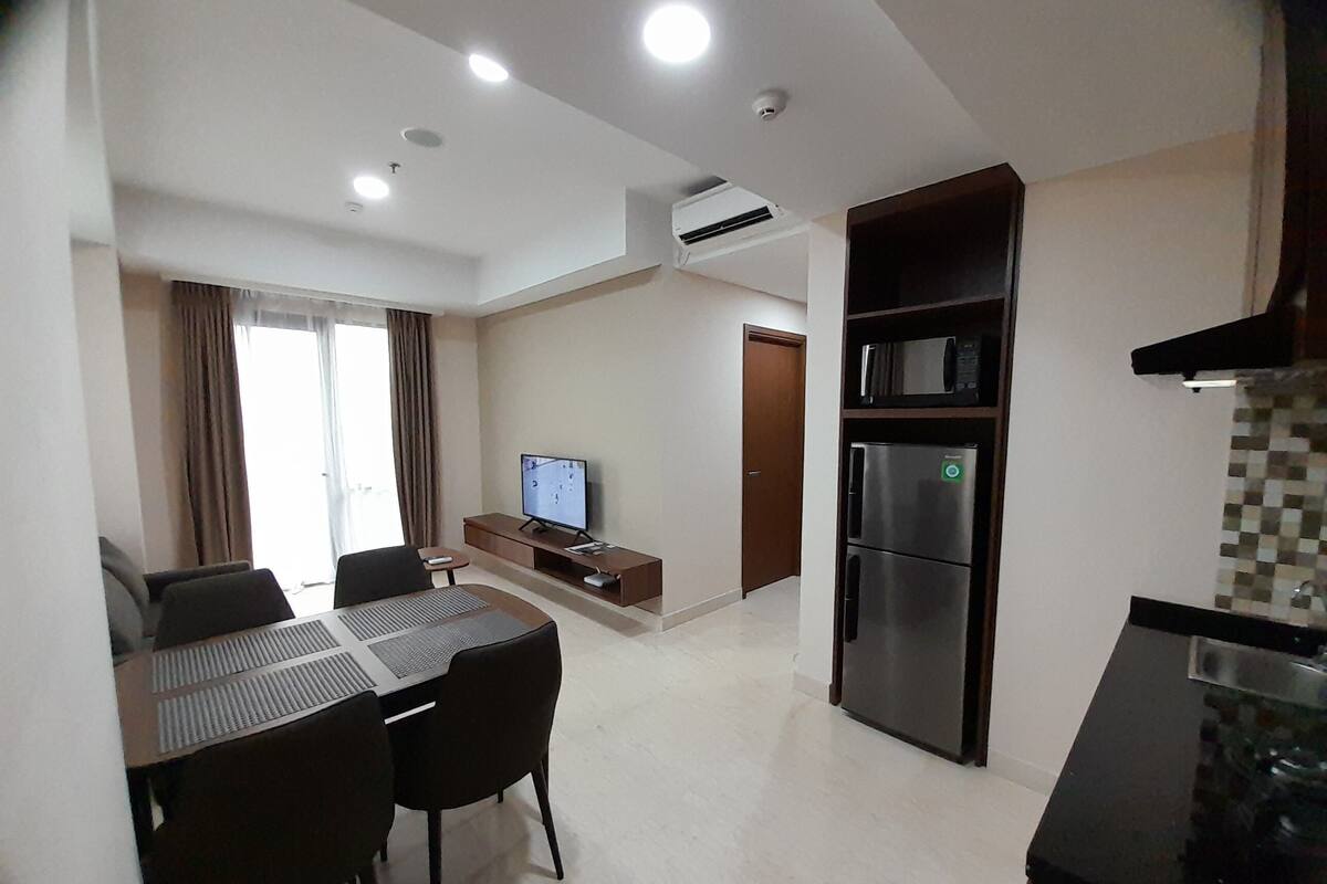 อพาร์ทเมนท์สำหรับครอบคร ัว (Two-Bedroom Apartment) | บริเวณนั่งเล่น | ทีวีจอแอลอีดี 40 นิ้ว พร้อมช่องดาวเทียม, ทีวี