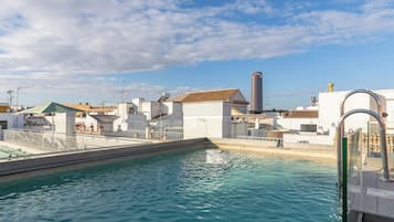 Seasonal outdoor pool, pool umbrellas, sun loungers