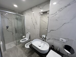 Hair dryer, towels, soap, toilet paper