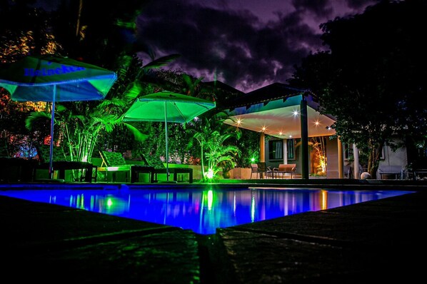 3 outdoor pools, open 6:00 AM to 8:00 AM, pool umbrellas