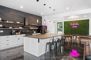 Fridge, microwave, oven, stovetop - The Haven -two kitchens, pool, large garage, minutes from the dunes. (Hurricane)