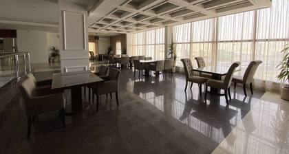 Triple Tree Serviced Apartments الشجرة الثلاثية للشقق المخدومة