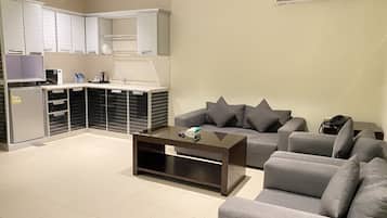Junior Suite, 1 King Bed | Living area