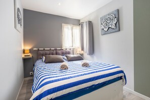 1 habitación, tabla de planchar con plancha, wifi gratis y ropa de cama 