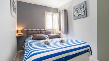 1 chambre, fer et planche Ă repasser, Wi-Fi gratuit, draps fournis