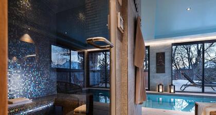 Grand chalet avec piscine intérieure, spa et salle de jeux