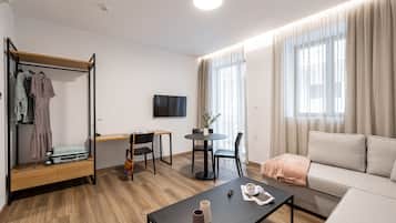 Family Apartment with Balcony | Living area | Flat-screen TV