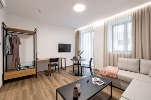 Family Apartment with Balcony | Living area | Flat-screen TV - Pnoe Urban Living (Nea Smirni)