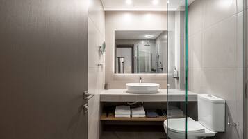 Superior Studio | Bathroom | Shower, free toiletries, hair dryer, slippers