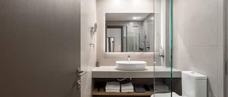 Superior Studio | Bathroom | Shower, free toiletries, hair dryer, slippers