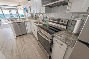 Fridge, microwave, coffee/tea maker, toaster