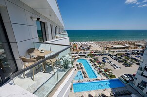 Comfort Apartment, Sea View | Minibar, desk, laptop workspace, blackout drapes
