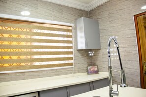 Appartamento Executive | Cucina privata | Microonde, lavastoviglie, risottiera, frullatore