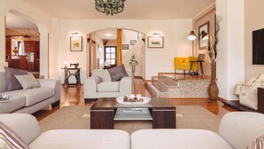 A spacious living area with a sofa set, a coffee table, and a chandelier. - Ines in Pula With 5 Bedrooms and 1 Bathrooms (Pula)