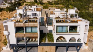 A modern multi-story building with balconies, large windows, and a flat roof. - Complex Wind Rose in Maru i i (Omis)