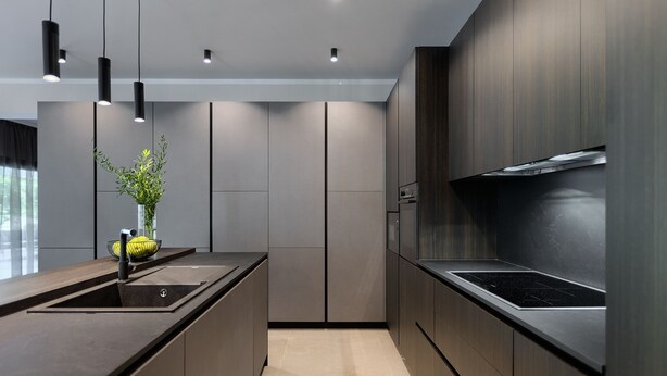 A modern kitchen with a central island, built-in appliances, and pendant lighting. - Viktor in Kr an With 7 Bedrooms and 7 Bathrooms (Krsan)