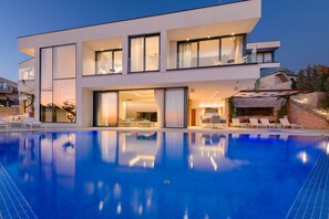 A modern two-story house with a swimming pool, large windows, and outdoor seating. - Anabel in Hvar With 4 Bedrooms and 4 Bathrooms (Hvar)