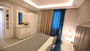 3 habitaciones, tabla de planchar con plancha, wifi y ropa de cama