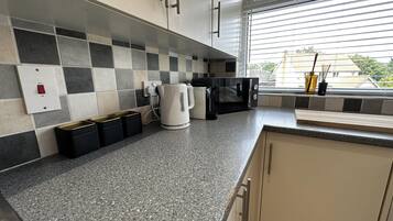 Apartment | Private kitchen | Fridge, microwave, oven, stovetop