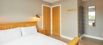 Host & Stay | The Old Jail Barber's Shop