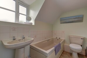 Bañera y secador de pelo