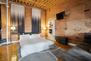 Apartment, 1 Bedroom | 1 bedroom, desk, laptop workspace, iron/ironing board - Downtown Detroit Loft - Fully equipped & Absolutely Gorgeous theme by RedAwning (Detroit)