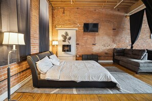 Apartment, 1 Bedroom | 1 bedroom, desk, laptop workspace, iron/ironing board - Downtown Detroit Loft - Fully equipped & Absolutely Gorgeous theme by RedAwning (Detroit)