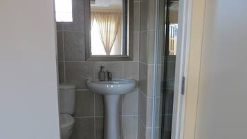 Comfort Double Room, 1 Queen Bed | Bathroom | Shower, rainfall showerhead, soap, shampoo