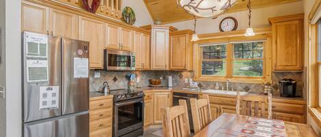 Condo, 2 Bedrooms | Private kitchen | Fridge, oven, coffee/tea maker, toaster