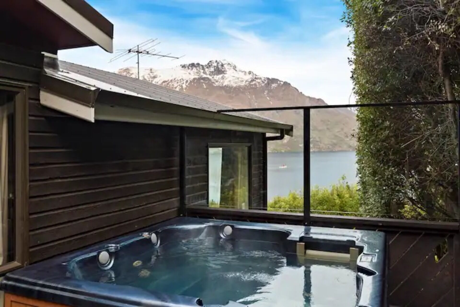 A hot tub area with a mountain view.