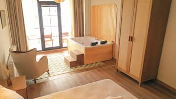 Deluxe Room | 1 bilik tidur, peralatan tempat tidur premium, gebar bulu kapas