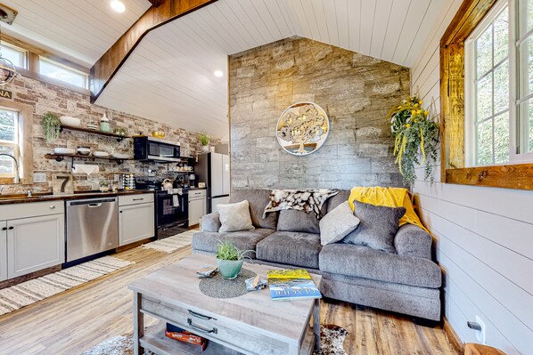 TV, fireplace - Rustic getaway with fireplace, patio area, board games, full kitchen, & TV (Kalispell)