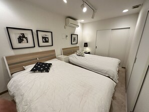 1 室のベッドルーム、WiFi (無料)、ベッドシーツ