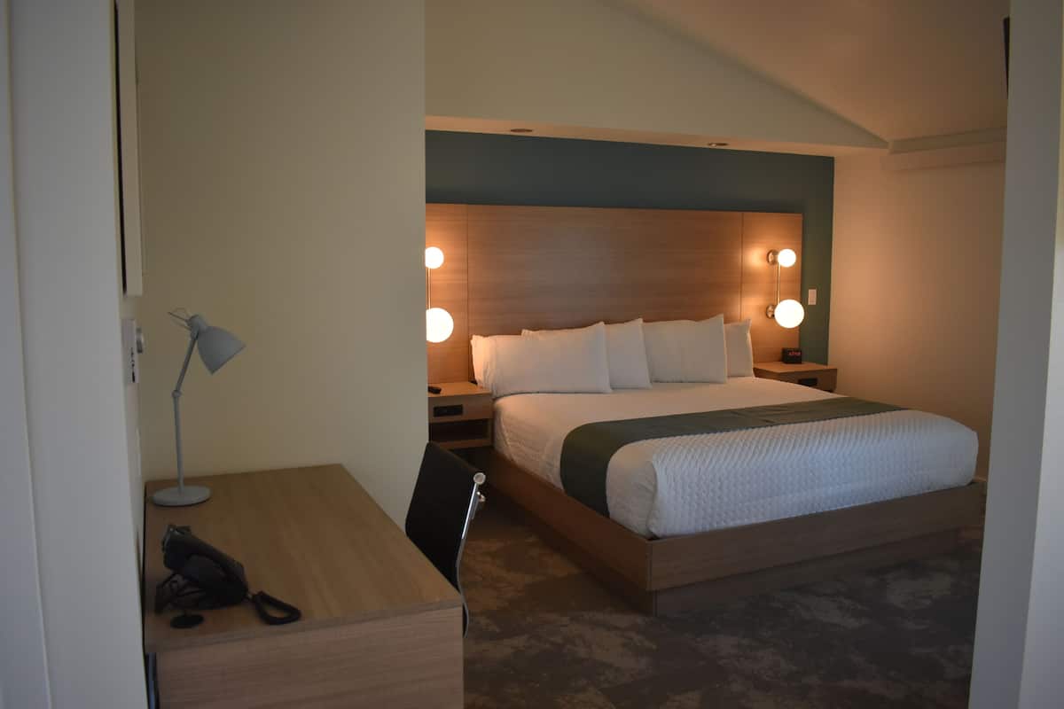 Standard Studio, 1 King Bed with Sofa bed | Living area | 50-inch Smart TV with cable channels, TV