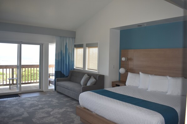 Signature Studio, 1 King Bed with Sofa bed, Kitchenette, Ocean View | Living area | 50-inch Smart TV with cable channels, TV