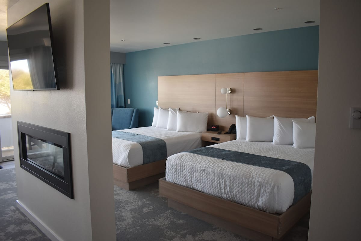 Family Double Room, Multiple Beds, Fireplace, Ocean View | Blackout curtains, iron/ironing board, free WiFi, bed sheets