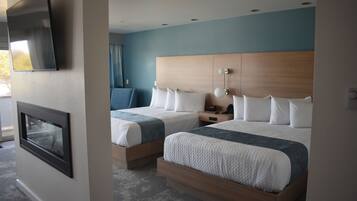 Family Double Room, Multiple Beds, Fireplace, Ocean View | Blackout drapes, iron/ironing board, free WiFi, bed sheets