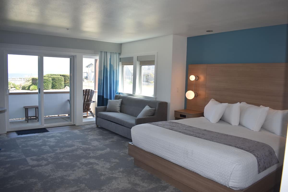 Deluxe Studio Suite, 1 King Bed with Sofa bed, Kitchenette, Ocean View | Living area | 50-inch Smart TV with cable channels, TV