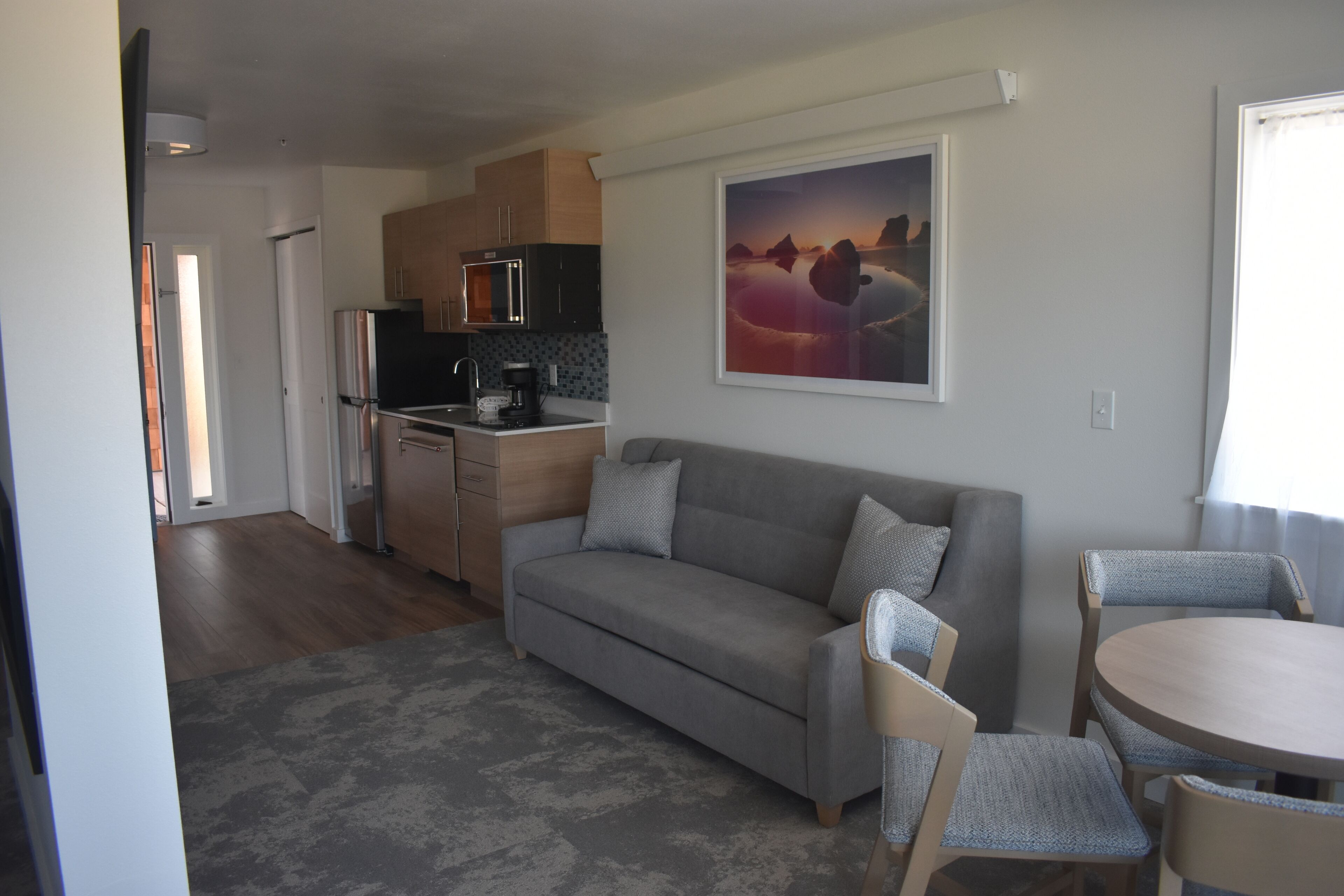 Family Double Room, Multiple Beds, Fireplace, Ocean View | Living area | 50-inch Smart TV with cable channels, TV