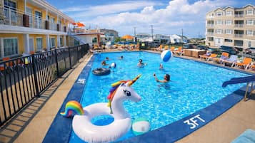 Seasonal outdoor pool, pool loungers