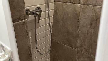 Shower, towels, toilet paper